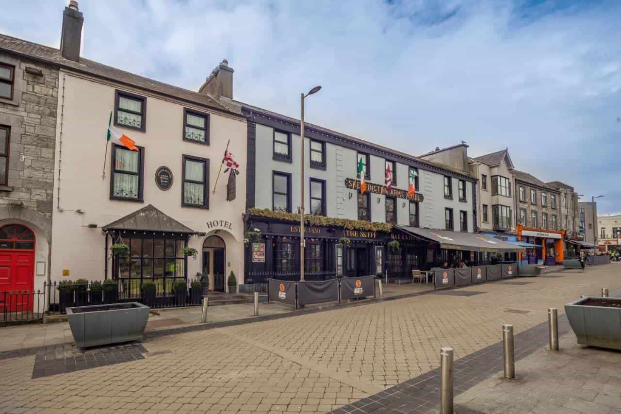 Skeffington Arms Hotel and The Skeff Bar & Kitchen storefronts on a paved pedestrian street.